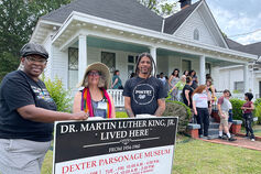 Freedom summer class stands outside MLK home.